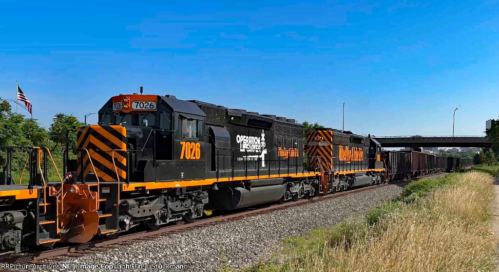 WE 7026